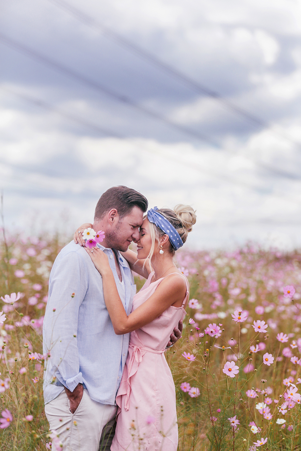 Couple in a field of flowers