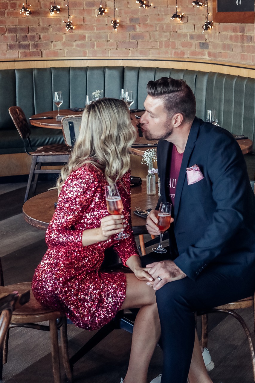 Couple Kissing Restaurant